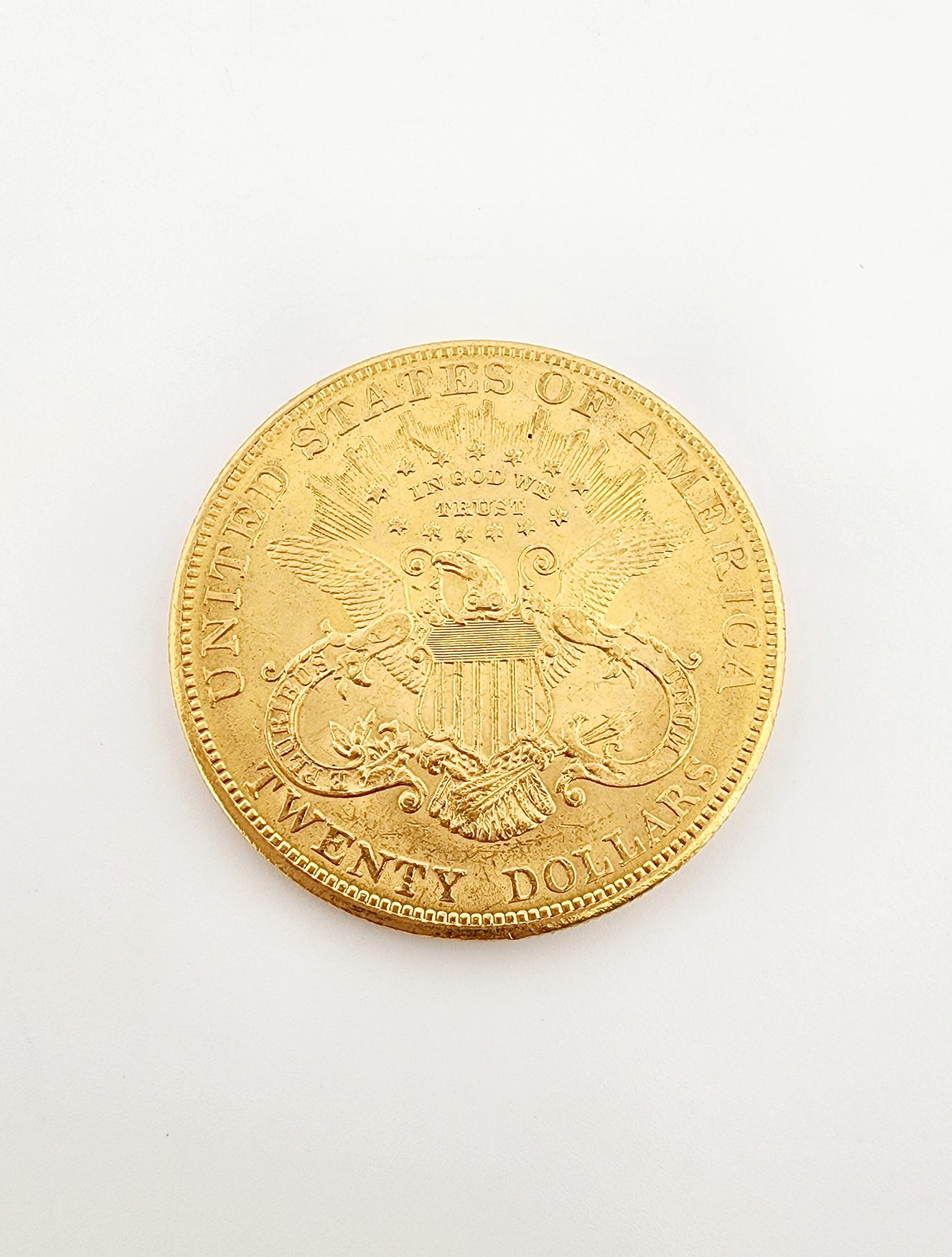 Moneda de $20 de 1904. 22k